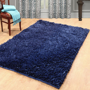 Calcote Hand Woven Shag Navy Area Rug