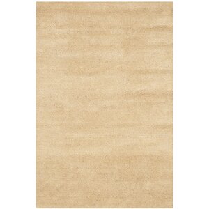 Trost Beige Area Rug