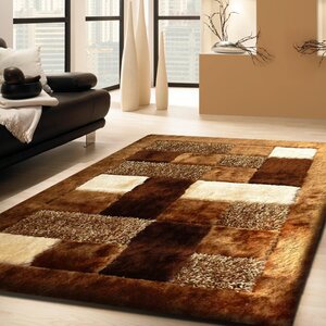 Arlosh Hand-Tufted Brown Area Rug