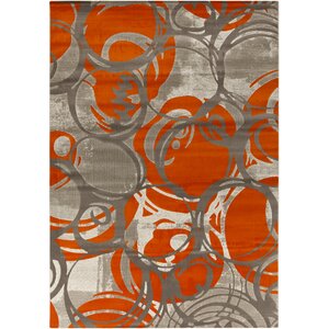 Clifford Machine Woven Orange Area Rug