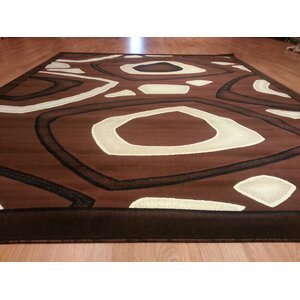 Hand-Carved Brown Area Rug