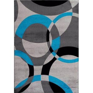 Bennet Abstract Turquoise Area Rug