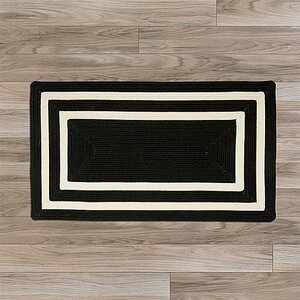 Marti Hand-Woven Outdoor Black Area Rug