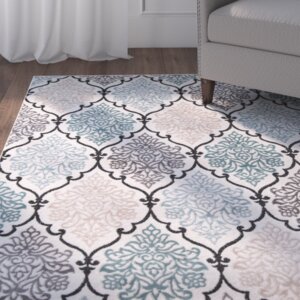 Kinsley Teal/Black Area Rug