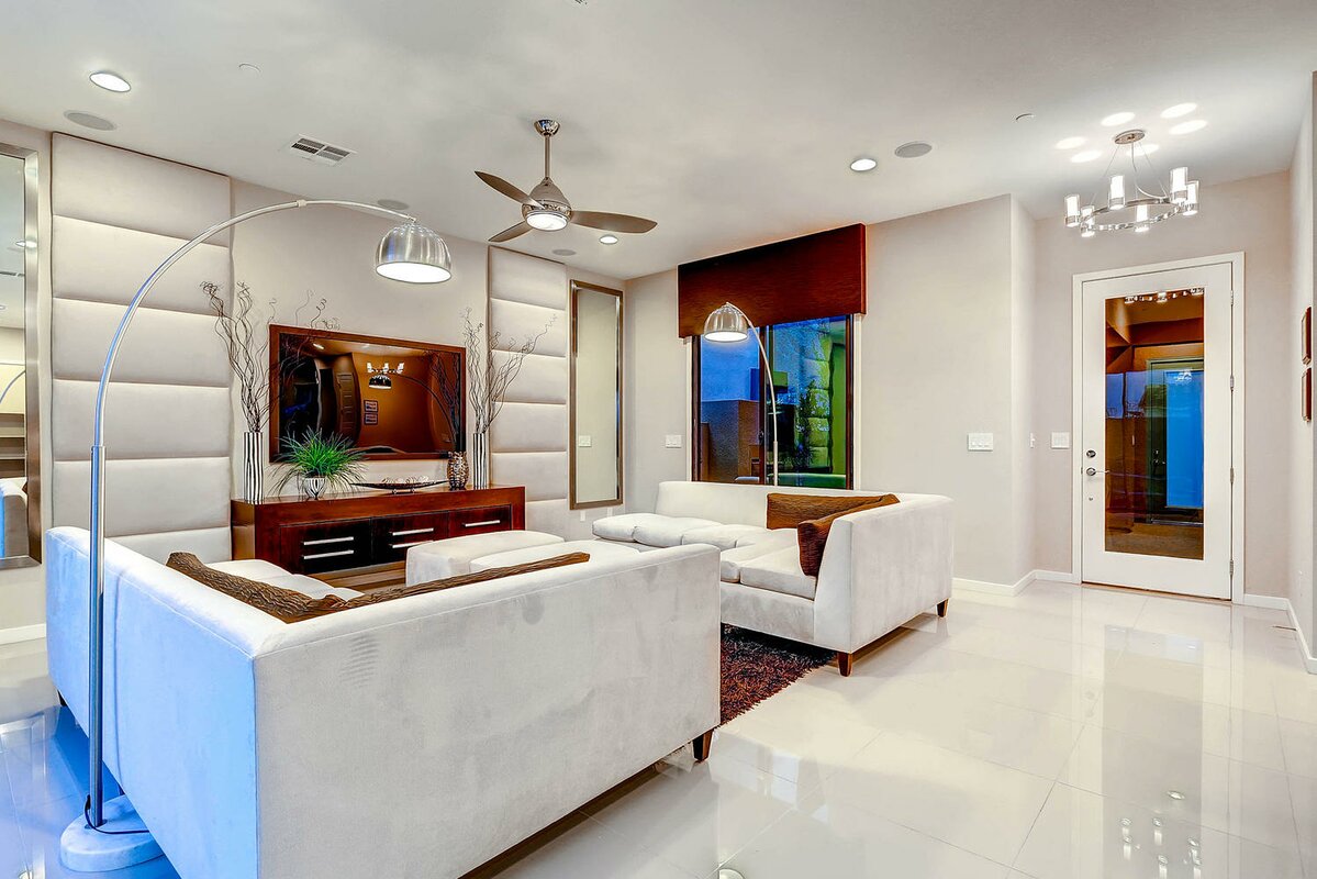 Premium Photo | White marble floor tile in brown wall hall luxury living  room with beige corner sofa side table