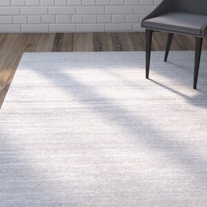 Busick Ivory/Silver Area Rug