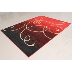 Olatayo Black/Orange Area Rug