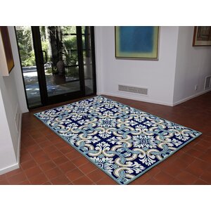 Demirhan Floral Tile Blue Area Rug