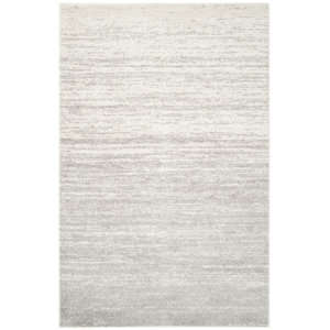 Busick Ivory/Silver Area Rug