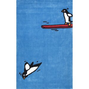Cine Diving Penguin Blue Area Rug