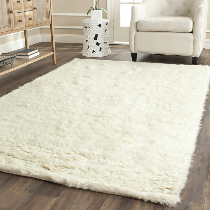 Safavieh Flokati Hand Tufted Wool Ivory Area Rug Reviews Flokati Hand Tufted Wool Ivory Area Rug