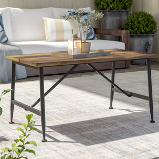 Metal Patio Tables You Ll Love Wayfair Cabarley Solid Wood Coffee Table