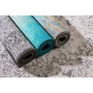 Illusion Turquoise Area Rug