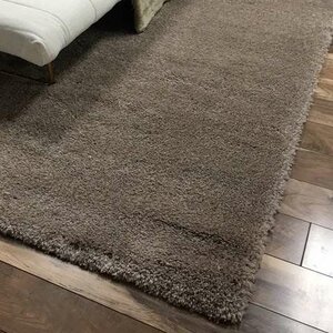 Hendricks Light Brown Area Rug