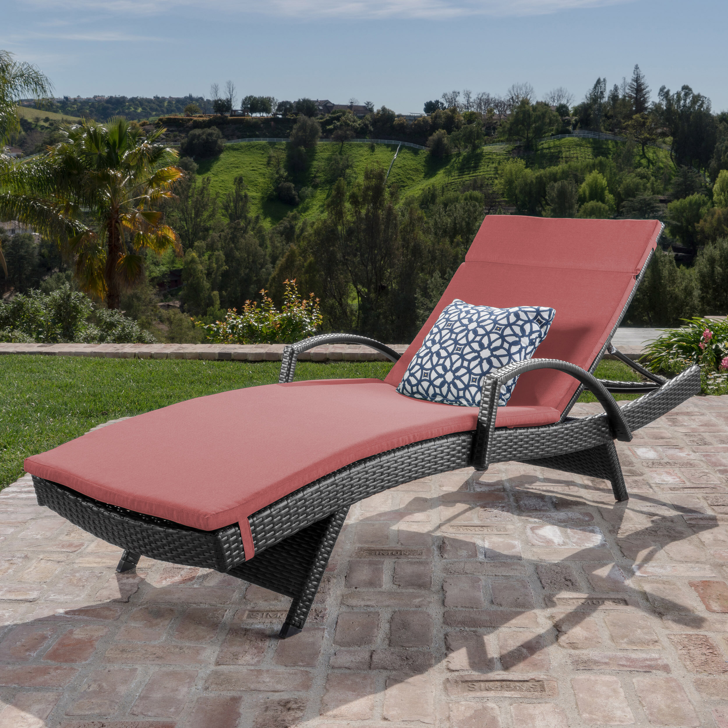 Gilleasbuig Outdoor Wicker Armed Chaise Lounge With Cushion