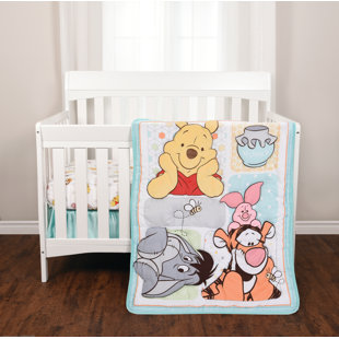 winnie the pooh cot bumper and quilt set