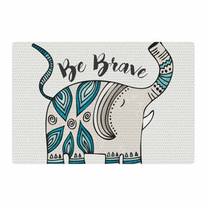 Pom Graphic Design Be Brave Typography Teal Area Rug