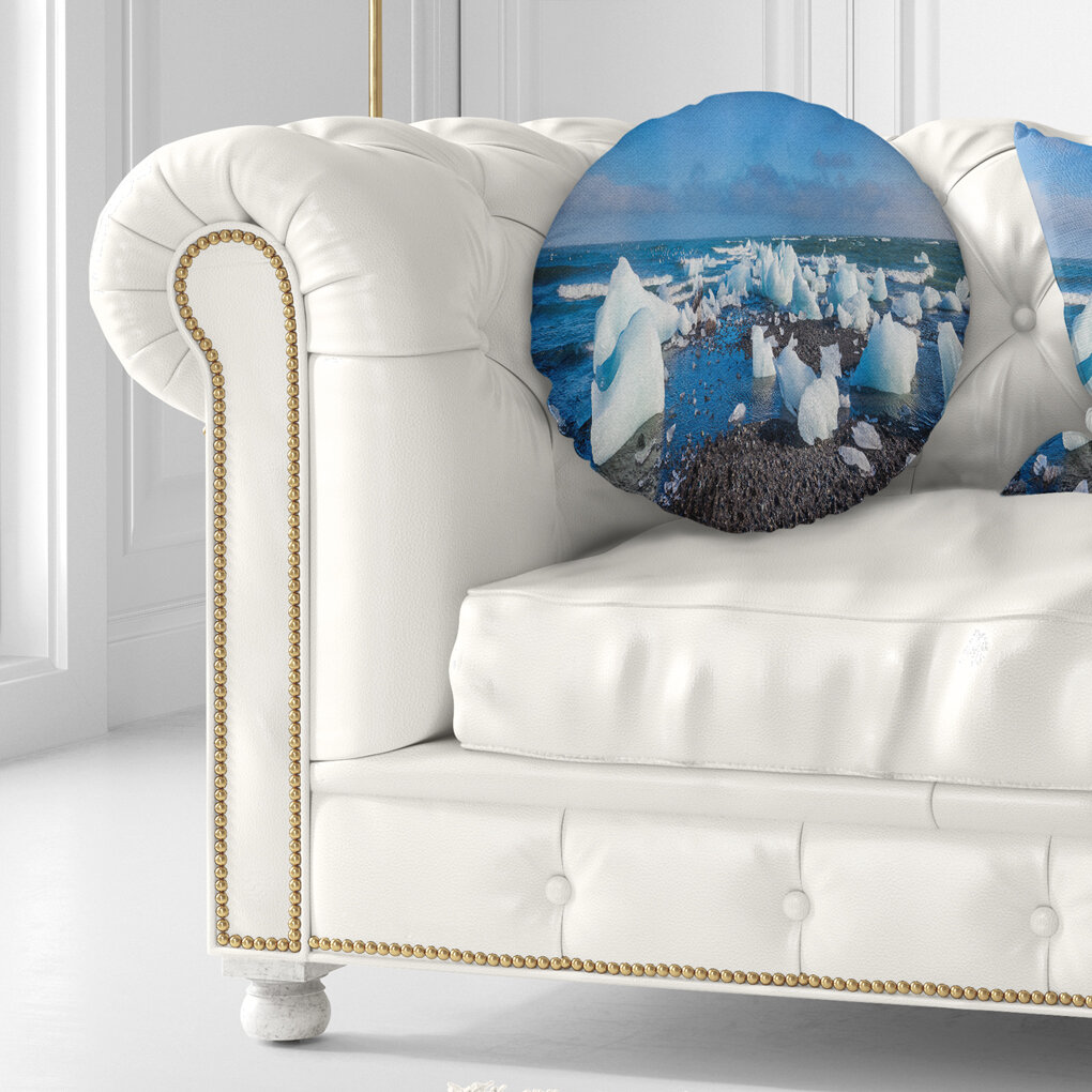 East Urban Home Seashore Ice Blocks On Sand Beach Throw Pillow