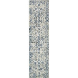 Akerlund Beige Area Rug