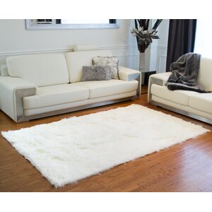 Shawnta Off-White Faux Sheepskin Area Rug