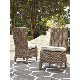 Patio Dining Chairs You Ll Love Wayfair Farmersville Patio Dining Chair With Cushion Set Of 2