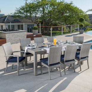 Patio Dining Sets You Ll Love Wayfair Castelli 9 Piece Sunbrella Dining Set With Cushions