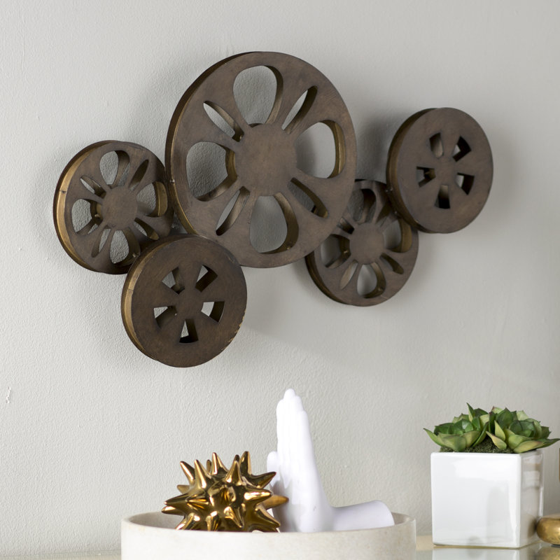 Brayden Studio Decorative Bronze Metal Movie Reel Sculpture Wall Decorative Bronze Metal Movie Reel Sculpture Wall Decor