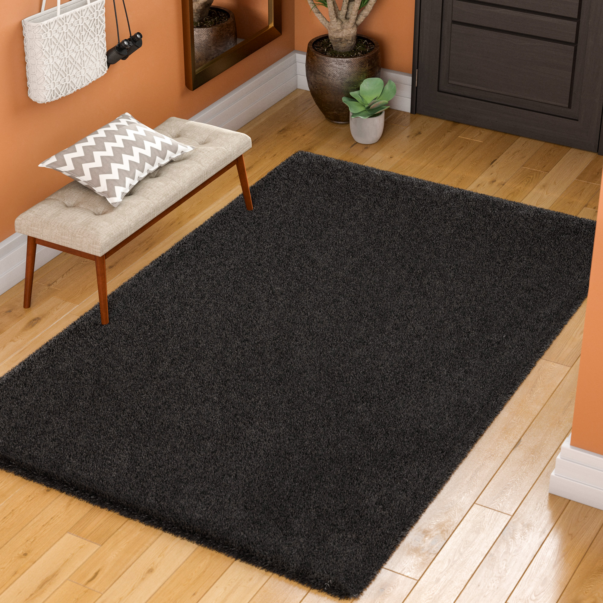 Starr Hill Solid Black Area Rug