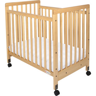 Portable Mini Cribs You Ll Love Wayfair Sonali Compact Size Slatted Portable Crib With Mattress