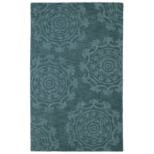 Ouinane Turquoise Solid Area Rug