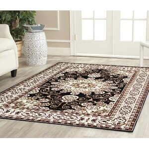 Meredosia Oriental Black/Beige Area Rug