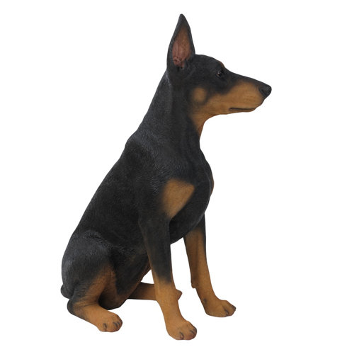 sitting doberman statue