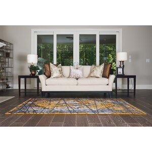 Yareli Black/Orange Area Rug