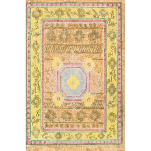 Carressa Yellow Area Rug