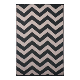 plastic area rug plastic straw clarimond blackbeige outdoor plastic area rug recycled straw wayfaircouk plastic area rug plastic straw clarimond blackbeige outdoor plastic area rug recycled straw wayfaircouk