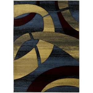 Zakkery Hand-Carved Blue/Yellow Area Rug