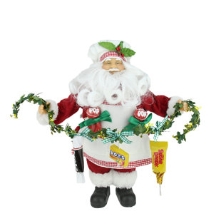 santa claus holding a garland with tootsie candies christmas decoration - Candy Christmas Decorations santa claus holding a garland with tootsie candies christmas decoration - Candy Christmas Decorations