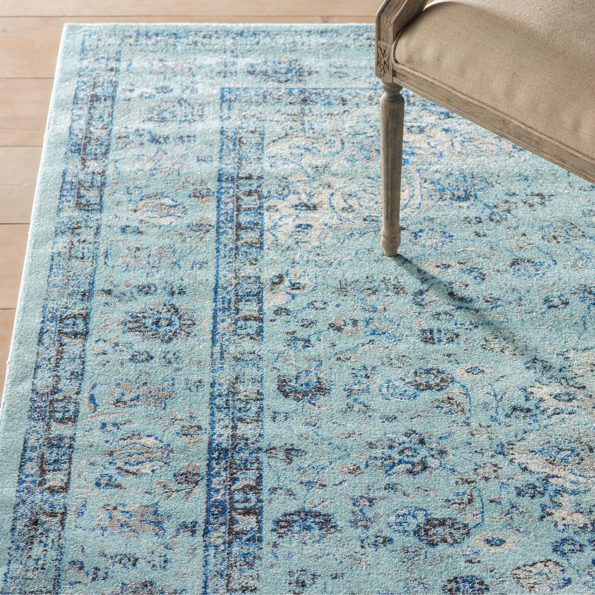 light blue rug with red
